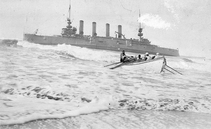 Coast_Guard_Surfboat_USSMilwaukee_Rescue U.S. Naval Historical Center Photograph # NH 46156 "Coast Guard surf boat in action near the wrecked USS Milwaukee, 13 Jan. 1917" U.S. Coast Guard surf boat in action, during the removal of crewmen from USS Milwaukee (Cruiser # 21) after she was wrecked at Samoa Beach, near Eureka, California, 13 January 1917. Note the large number of men standing on the grounded cruiser's decks. U.S. Naval Historical Center Photograph, Public domain, via Wikimedia Commons